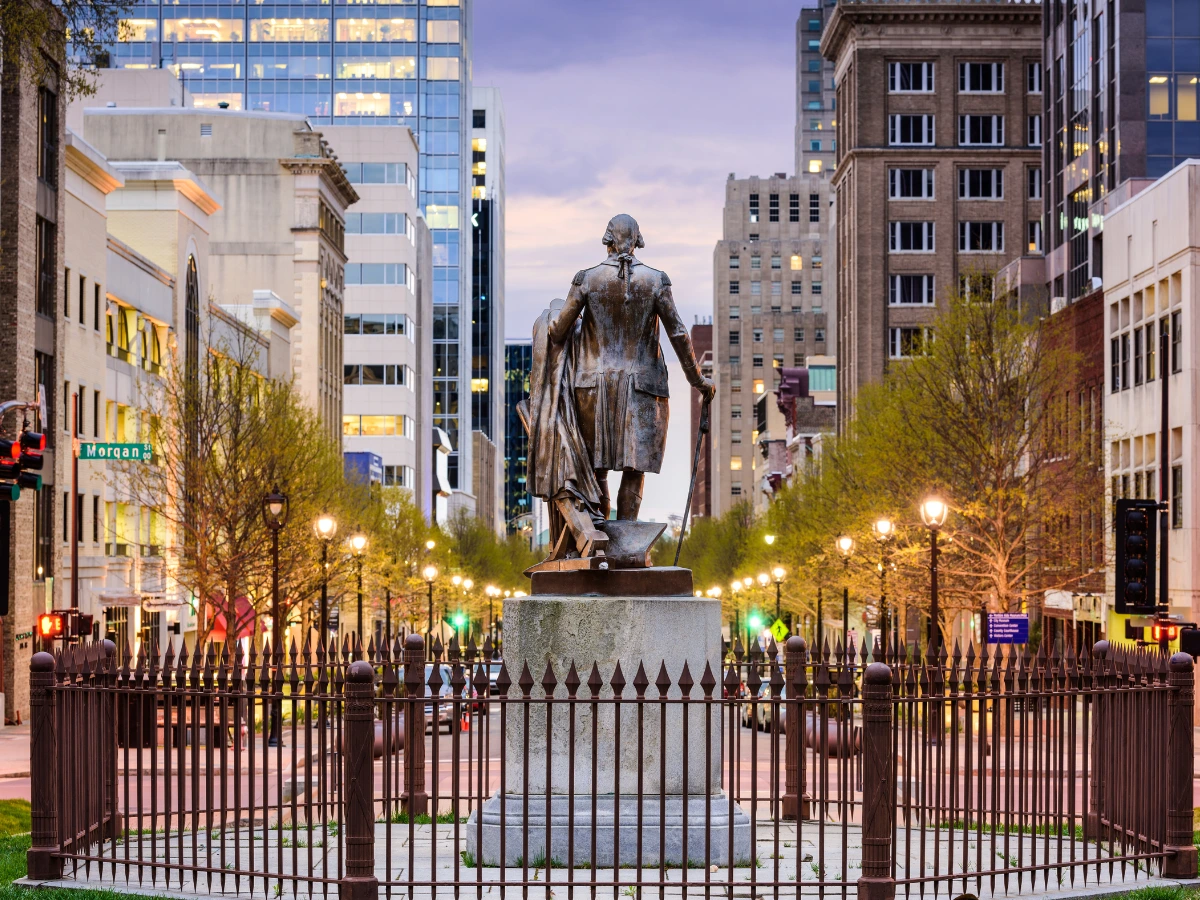 Historic statue in downtown Raleigh, North Carolina, symbolizing the city's cultural heritage and the notable individuals who have shaped Raleigh's history and national influence.