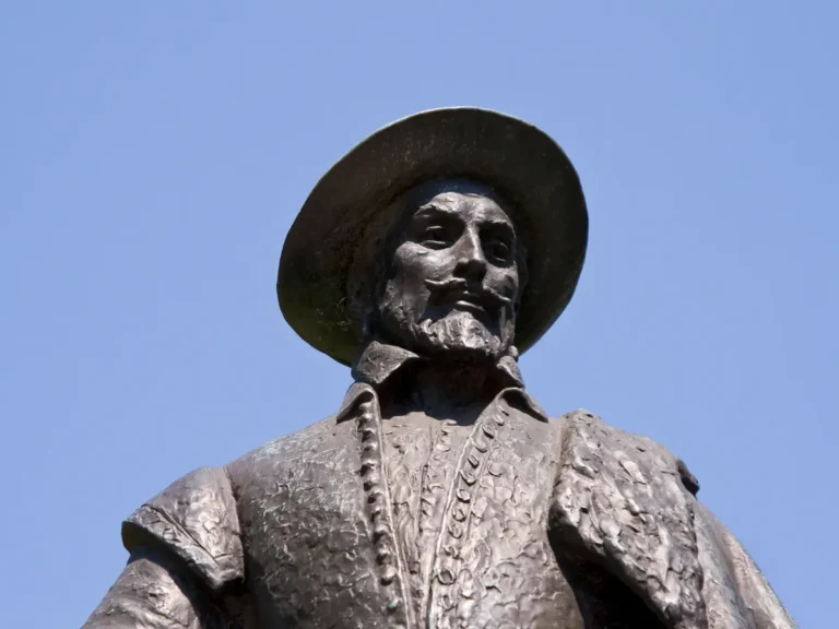 Bronze statue of Sir Walter Raleigh, the English explorer for whom Raleigh, North Carolina, was named, reflecting the city's historical origins and namesake.